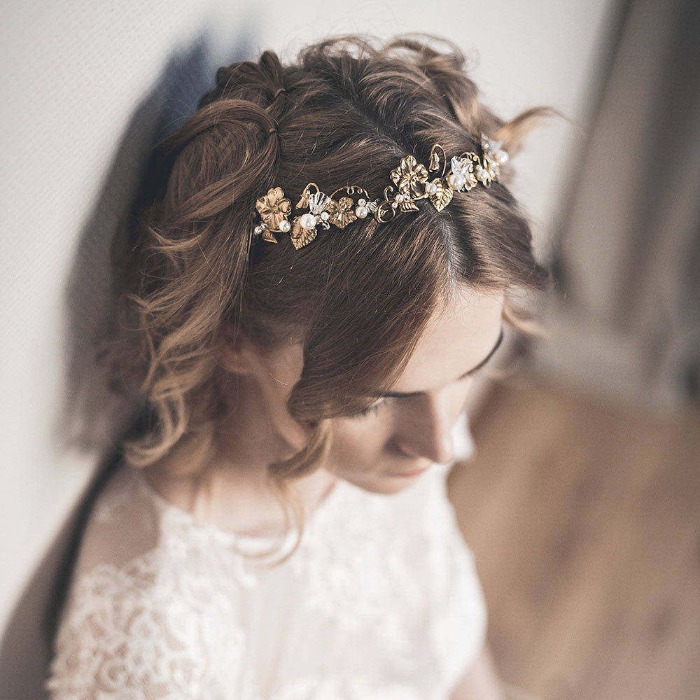SYBIL gold floral headband styled with lace wedding dress