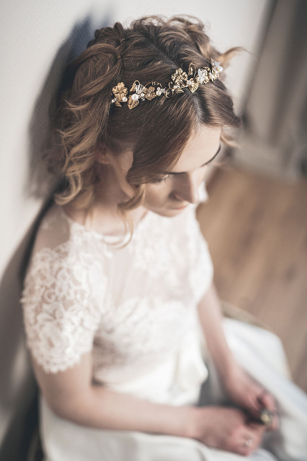 SYBIL gold floral headband styled with lace wedding dress