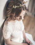 SYBIL gold floral headband styled with lace wedding dress