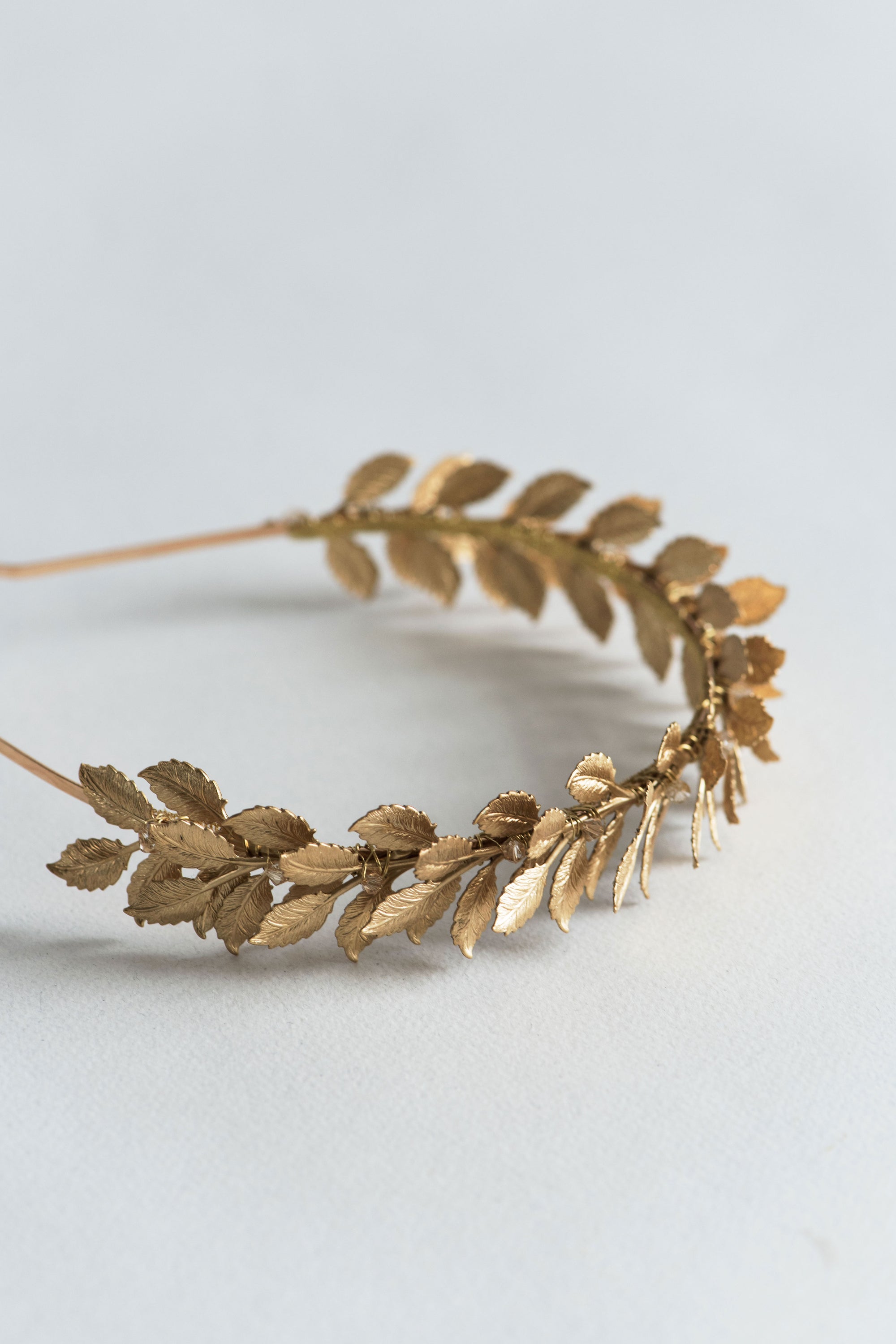 Top view of CLOTILDE gold laurel bridal headband inspired by ancient Roman wreaths