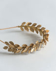 Top view of CLOTILDE gold laurel bridal headband inspired by ancient Roman wreaths