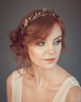 Gold laurel leaf bridal crown worn by bride, Greek goddess inspired headpiece