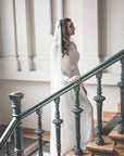 Bride wearing JANE simple narrow veil in soft English tulle — ivory