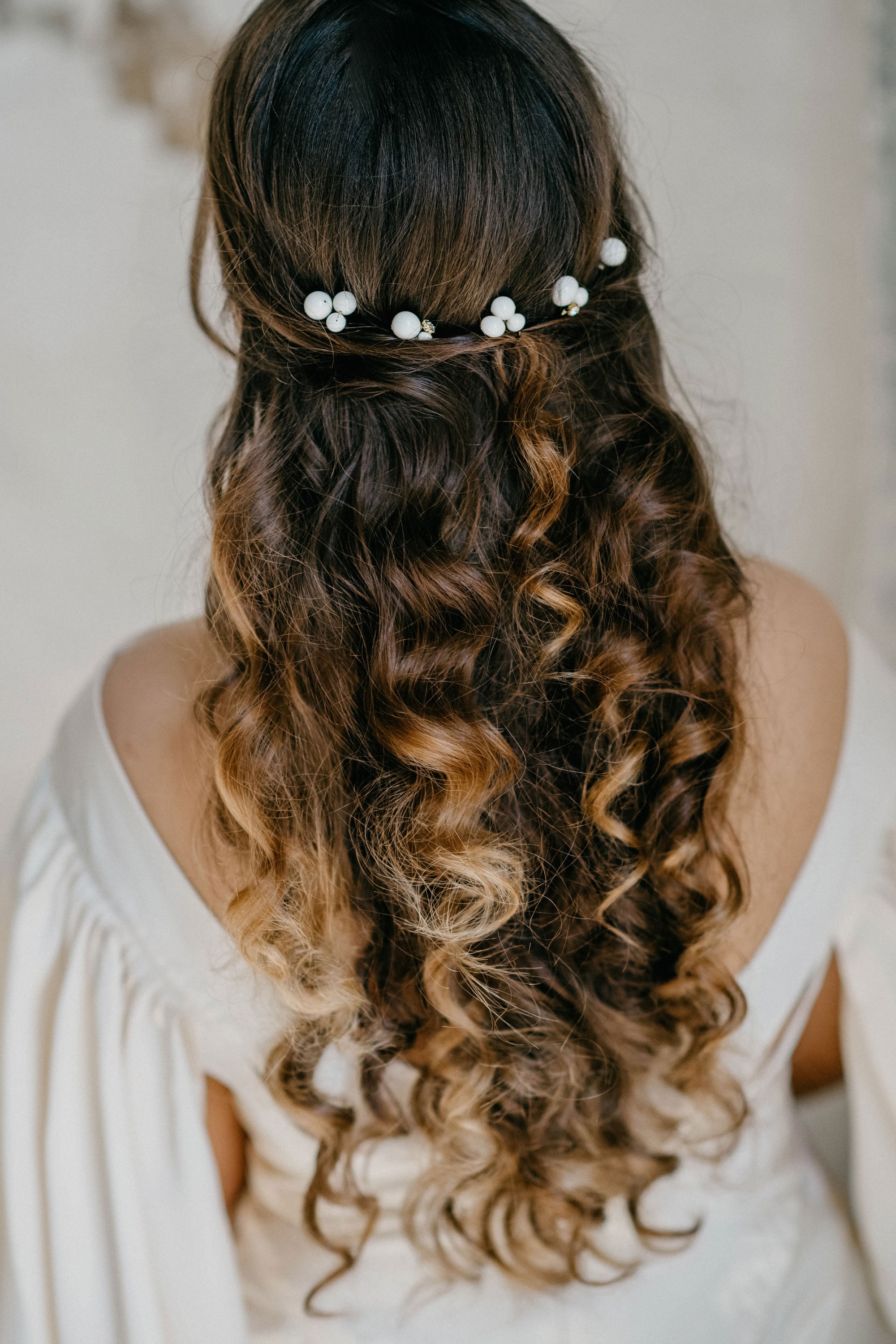 ALSA bridal pearl hair pins styled in romantic boho hairstyle

