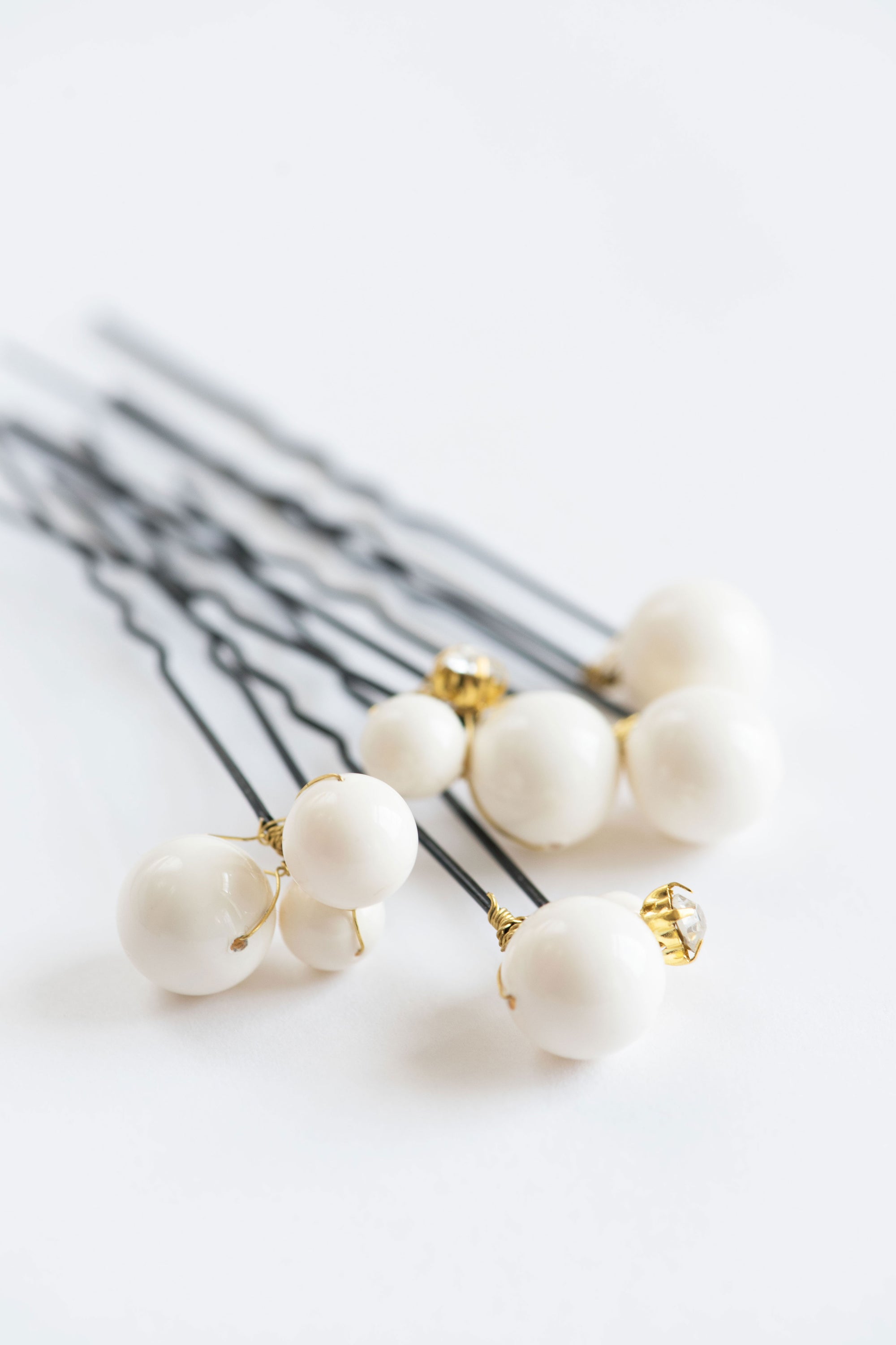 Close-up of ALSA pearl pins set for weddings