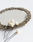 ALSA bridal pins styled on vintage mirror
