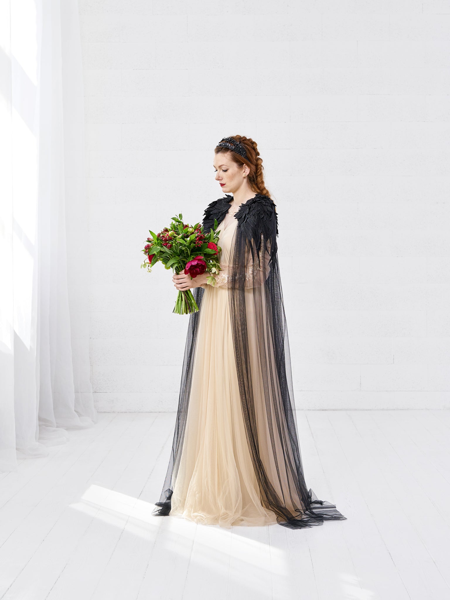 Medieval inspired black bridal cloak in soft English tulle, feathered lace on top