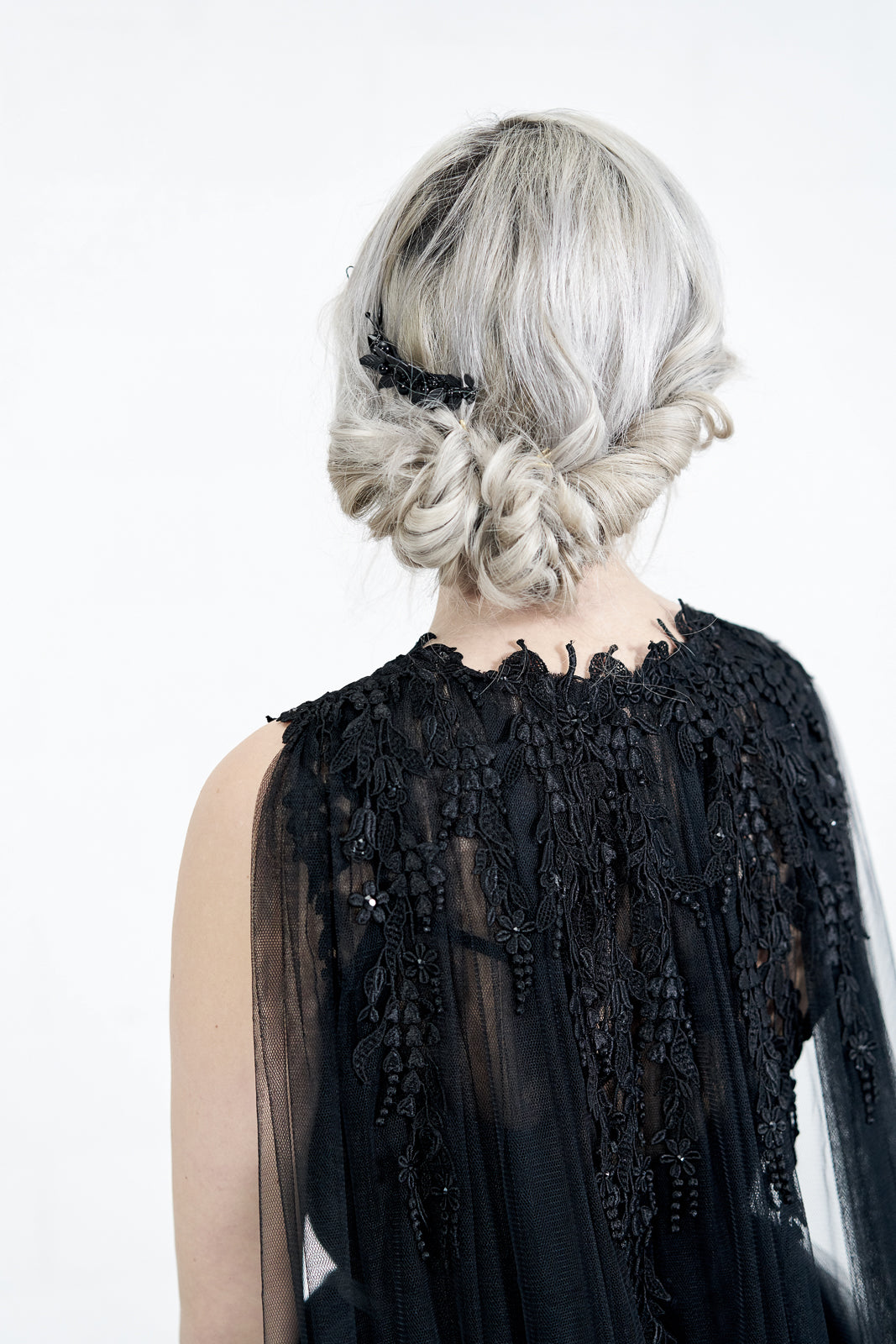 Black English tulle wedding cape with lace shoulder detail and glass crystals