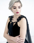 Front close-up of TARJA black bridal cape with lace and crystal embellishment